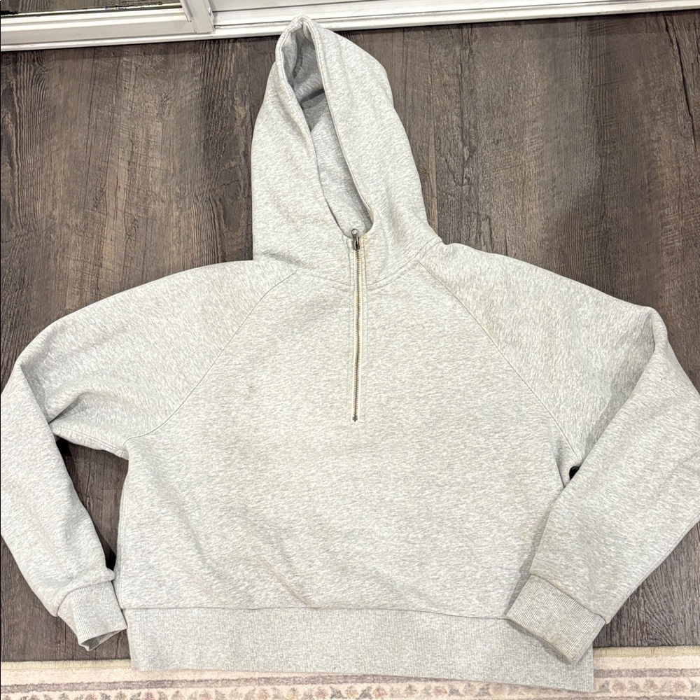 Gray Half-Zip Hoodie by Vuori. Thick comfortable hoodie that hits at the waist.